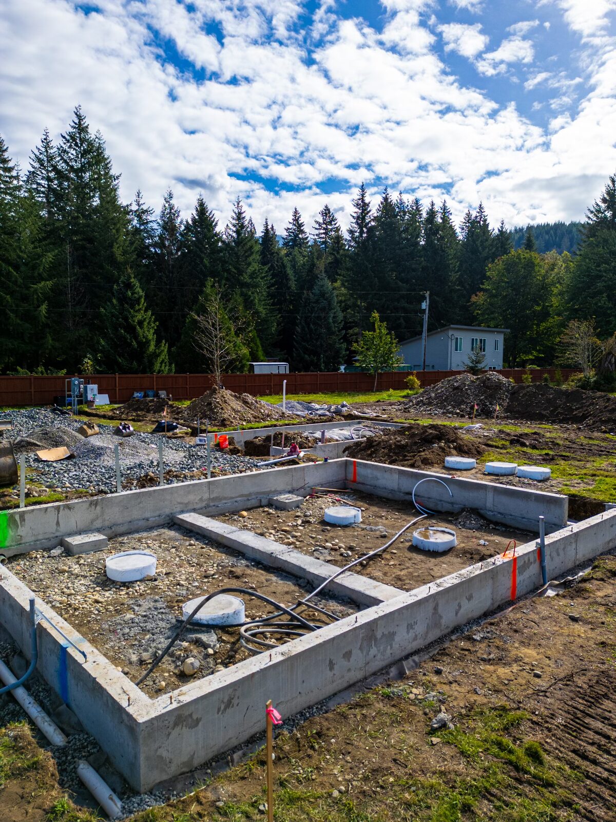 Aerial of foundation walls with septic tanks in place