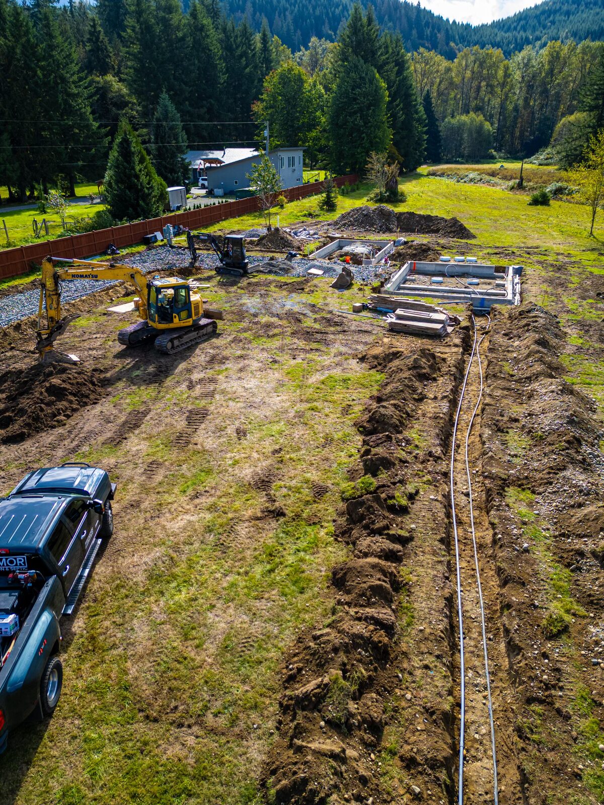 Tremor crew on a graded site, ready for stake-out